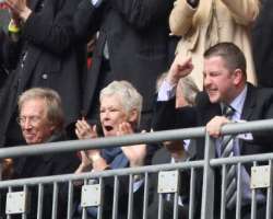 Dench is a huge soccer fan and supports 